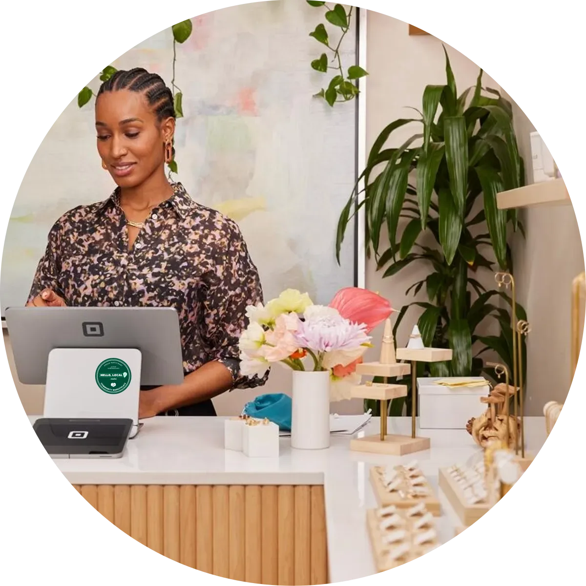 Merchant with Goodbuy community marketing at the point of sale